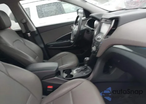 2014 Hyundai Santa Fe Sport 2.4L z USA, uszkodzony, nr VIN 5XYZUDLB9EG209397